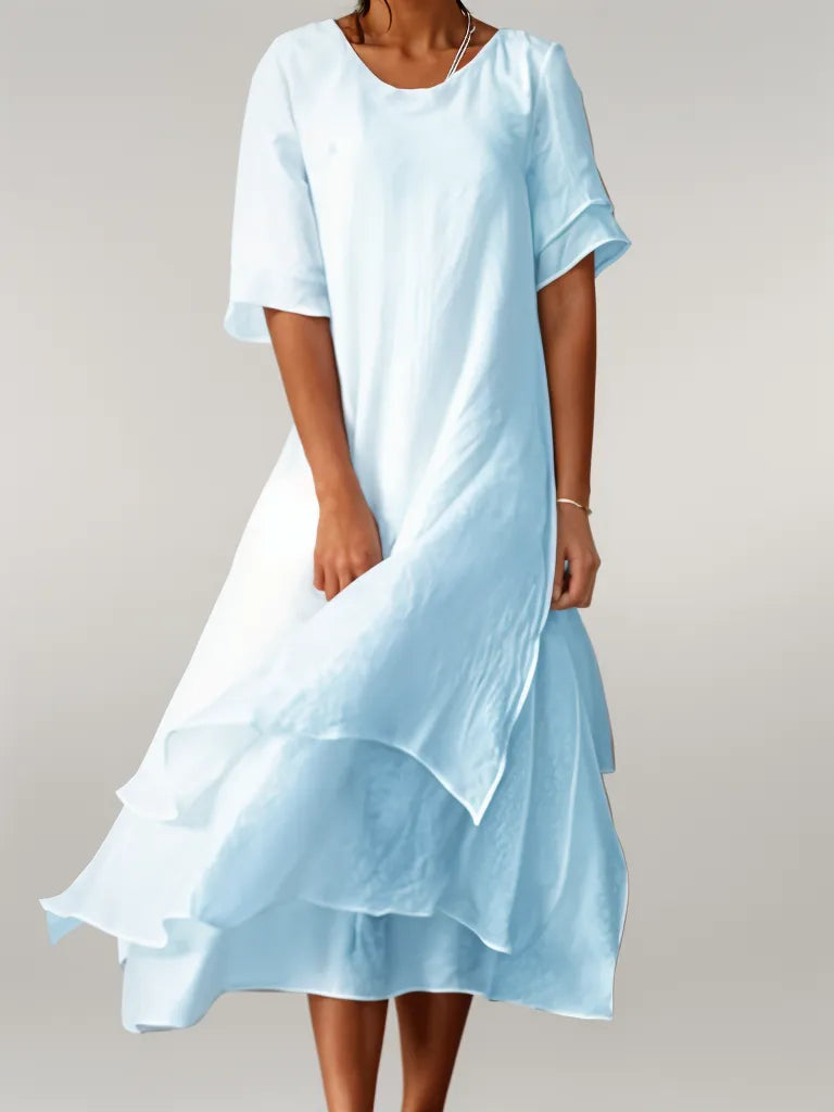 Short cape midi dress with sleeves and round neckline